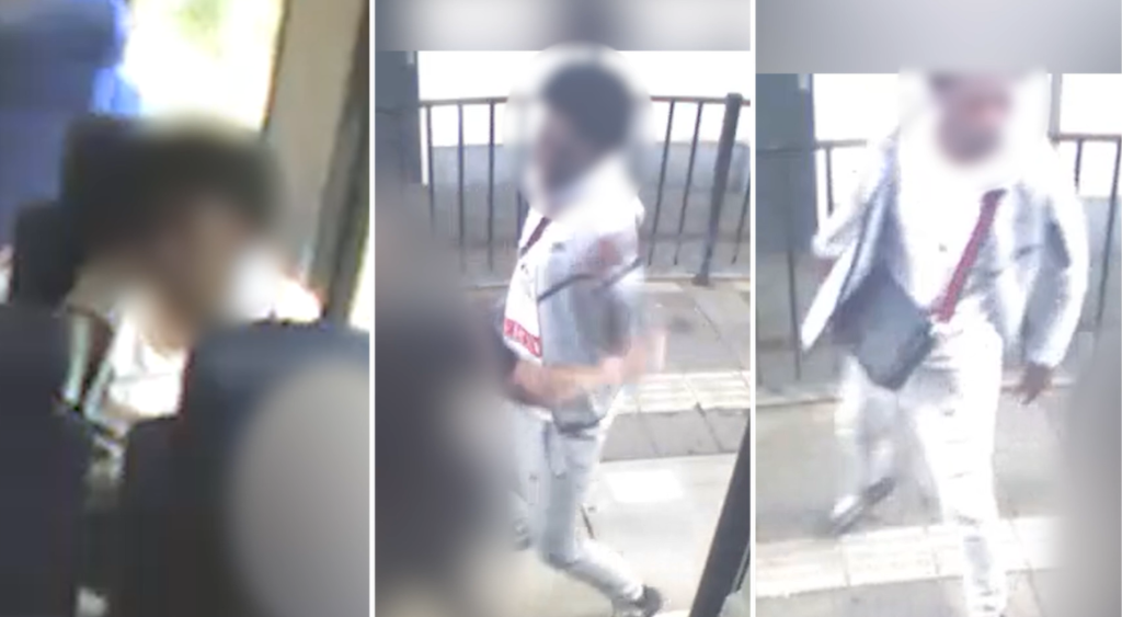 Geblurde bewakingsbeelden van een mogelijk minderjarige verdachte in een grijs Nike Tech Fleece pak die een conducteur mishandelde.