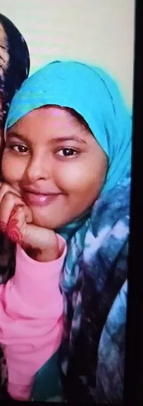 Opsporingsfoto van de vermiste 15-jarige Reem met een bruine hoofddoek.
