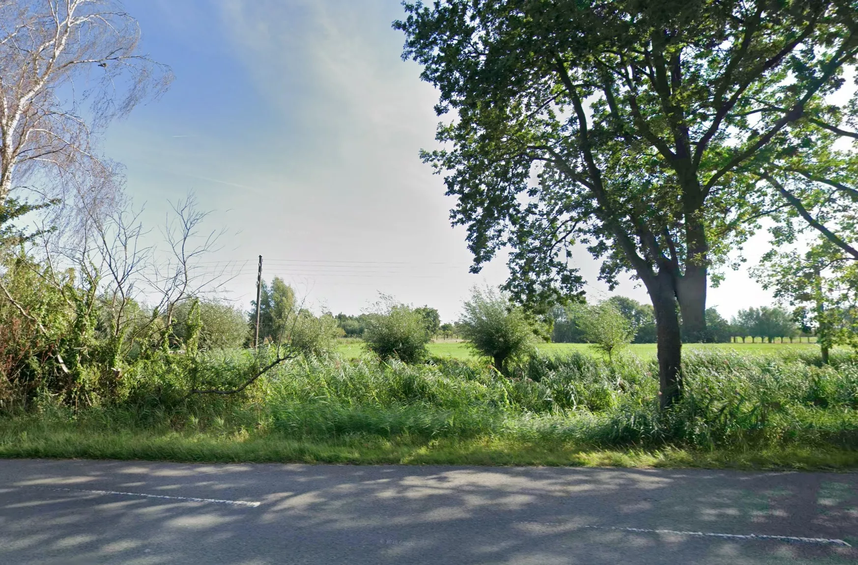 Een weiland aan de Schoonhovenseweg in Gouda, waar een overleden persoon is aangetroffen.